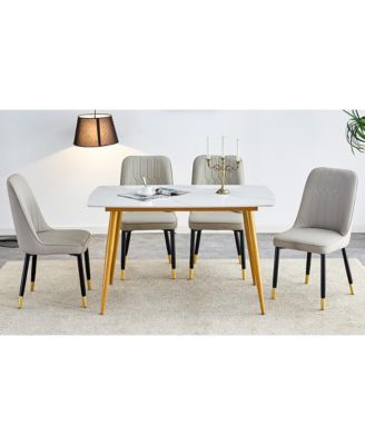 Table and chair set.A morden table with White imitation marble patterned stone burning tabletop with golden metal legs.Paired with 4 chairs with PU leather backrest and black metal legs.