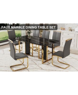Table and chair set. Modern dining table with MDF top and beautiful MDF legs. Equipped with comfortable PU chairs and metal legs. Suitable for a wide range of decorative styles.