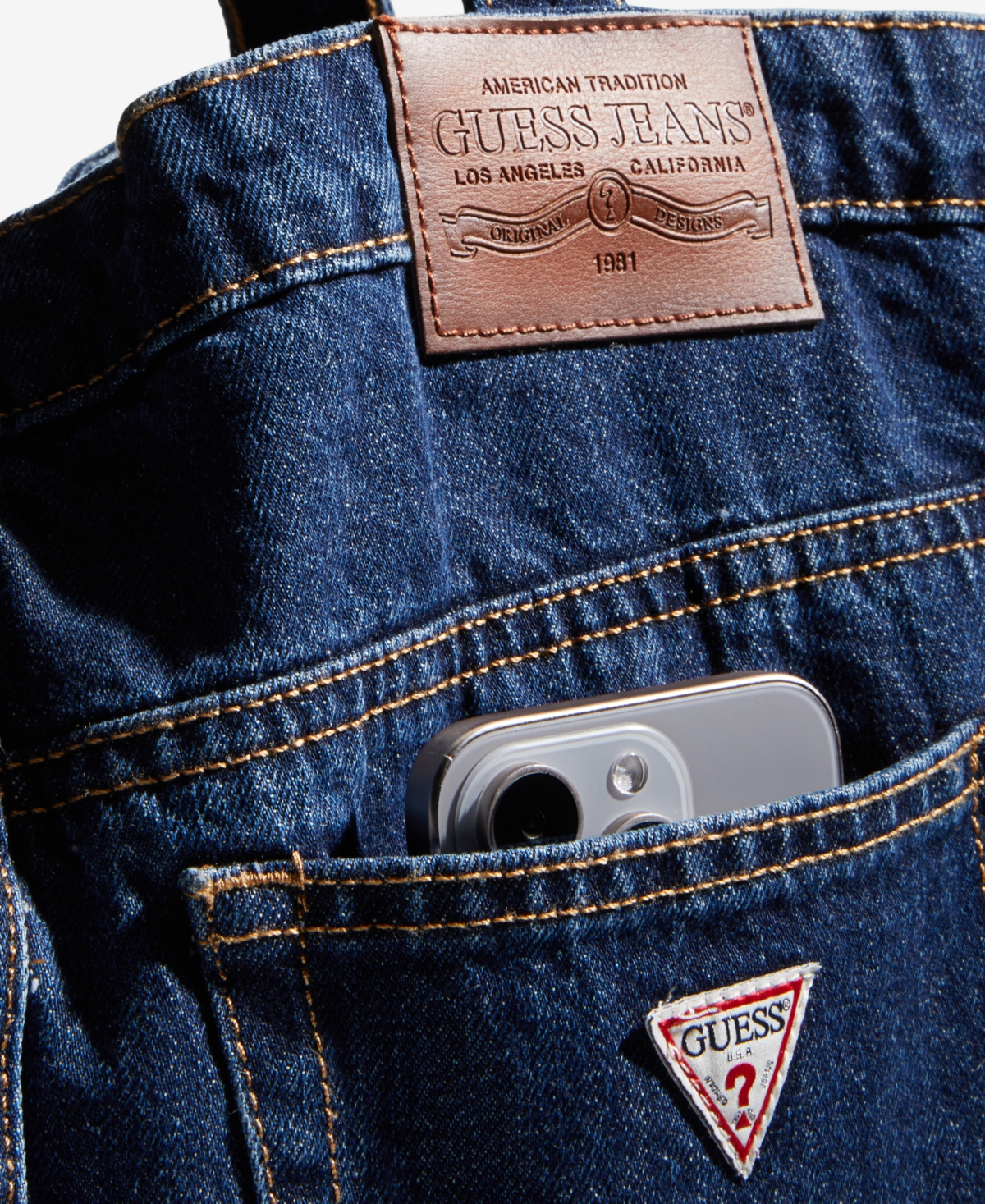 Receive a Free Guess Jeans Denim Bag with $125 Guess Jeans purchase