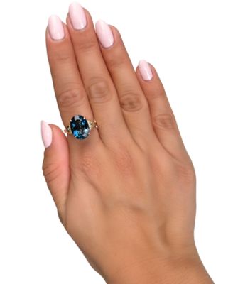 London Blue Topaz (6-3/8 ct. t.w.) & Diamond (1/20 ct. t.w.) Oval Ring in 14k Yellow Gold