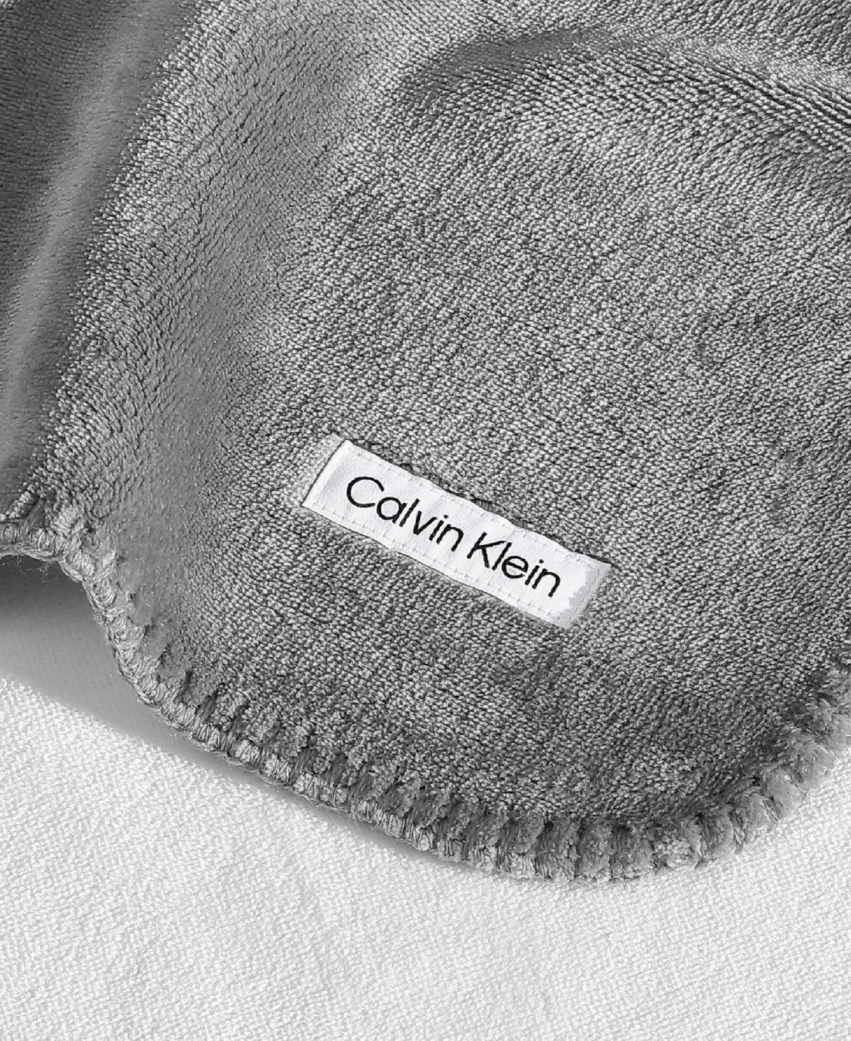 Calvin Klein Modern Solid Reversible Throw, 70" X 50" In Gray