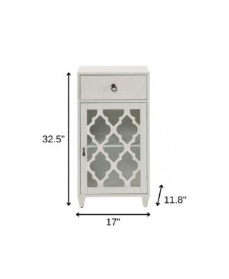 Fret Work Glass Door Cabinet with Decorative Accents and Storage