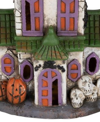 22.75" LED Lighted Haunted House with Skulls Halloween Decoration