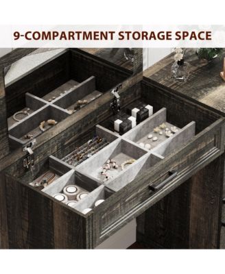 Vanity desk with mirror and storage drawers.