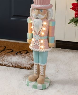 28" Lighted Macaron Resin Christmas Cupcake Nutcracker Porch D&eacute;cor