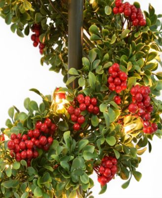 Puleo 4' Pre-Lit Artificial Potted Swirl Tree Adorned with Red Berries