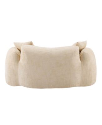 Beige curved two-person compress sofa with armrests and two pillows.