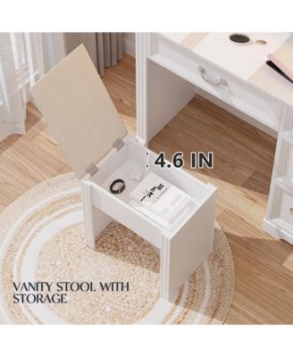 Vanity desk for bedroom with lights, drawers, shelves, stool, and mirror.