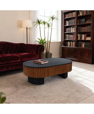 Elliptical coffee table with storage