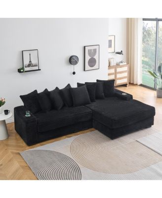 corduroy sofa with cup holder, storage, and reversible recliner.