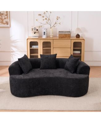 Crescent-shaped, modern self-inflating two-seater sofa with deep cushions
