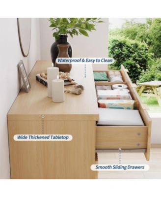 47'' modern dresser with 7 drawers and gold handles—stylish storage for bedroom, living room, hallway, or entryway.