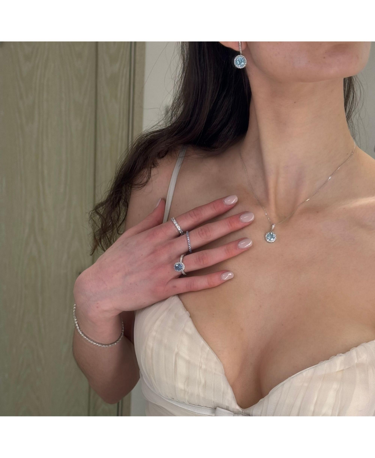 Suzy Levian Sterling Silver Cubic Zirconia Alternating Stone Eternity Band Ring