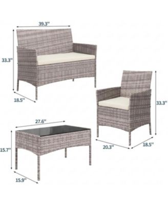 4-Piece Rattan Patio Furniture Set with Upholstered Sofa and Coffee Table