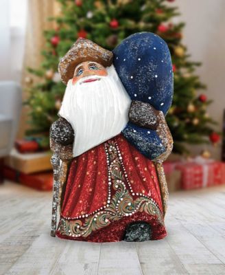 Woodcarved and Hand Painted Santa Yuletide Village Visitor with Bag Figurine