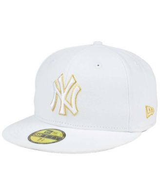 white and gold yankees hat