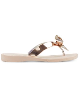 guess rose gold flip flops