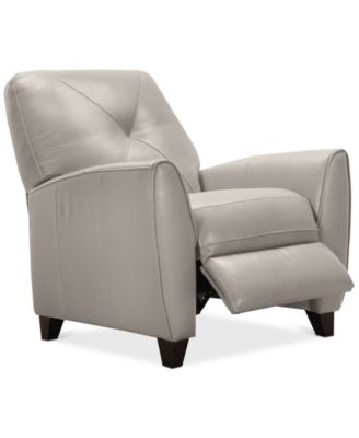 cream tufted recliner