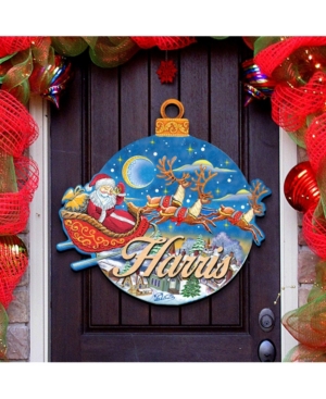 Designocracy Up and Away Santa Wooden Family Name Door Hanger