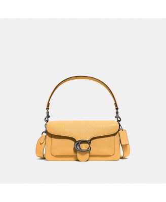 mustard coach purse