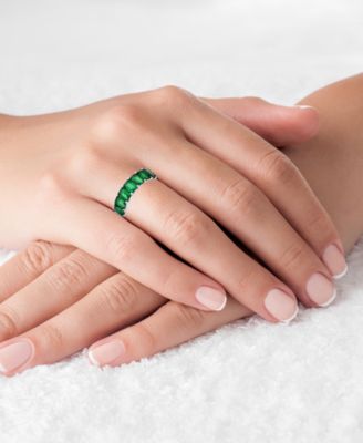 Green Emerald Cut Cubic Zirconia Eternity Band in Rhodium Plated Sterling Silver