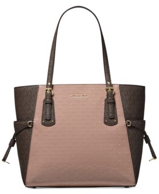 voyager east west leather tote