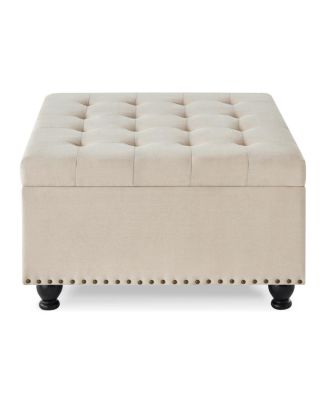 Beige upholstered storage ottoman with wooden legs