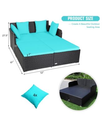 Spacious Outdoor Rattan Daybed with Upholstered Cushions and Pillows