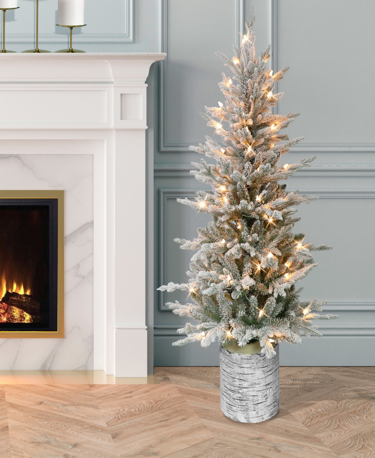 Puleo International 4.5 ft. Pre-Lit Potted Flocked Scandinavian Fir Artificial Christmas Tree with 70 Ul-Listed Clear Lights
