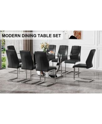 Table and chair set.Contemporary, minimalist rectangular dining table featuring a clear tempered glass top and sleek silver legs. Paired with chairs made of PU material cushion and silver metal legs.