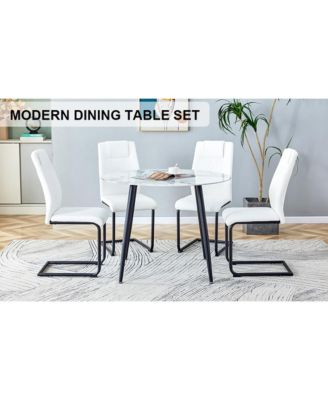 Table and chair set. Large modern white imitation marble patterned round table with black metal legs. Nice minimalism, comfortable seats and black metal legs.