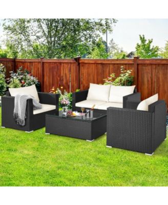 4 Pieces Patio Rattan Conversation Set with Padded Cushion and Tempered Glass Table