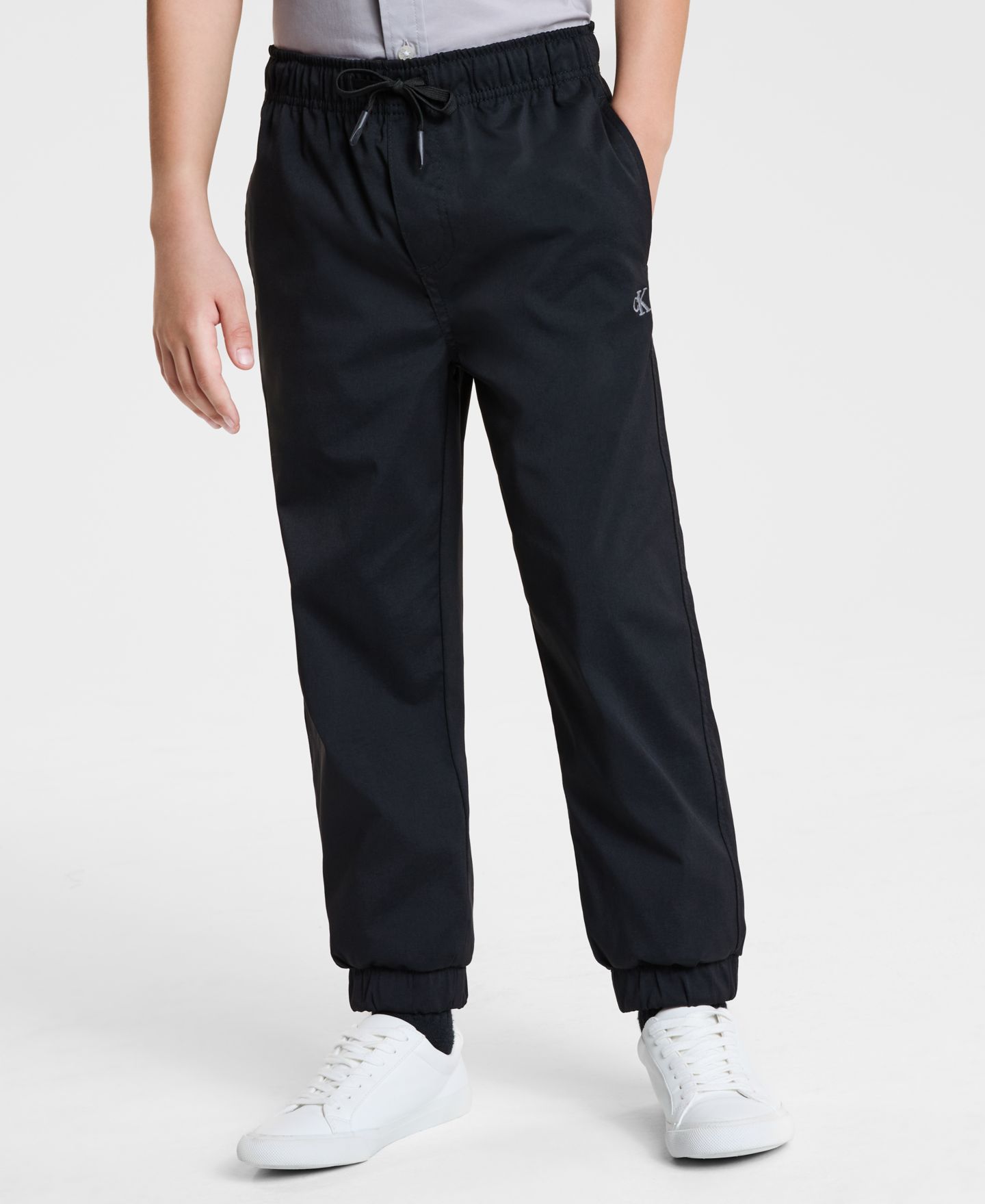 Брюки Calvin Klein Stretch Comfort Jogger для мальчиков, цвет: Чёрный — фото 1