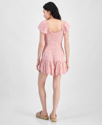 Juniors' Flutter-Sleeve Smocked Ruffle-Hem Romper