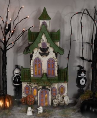 22.75" LED Lighted Haunted House with Skulls Halloween Decoration