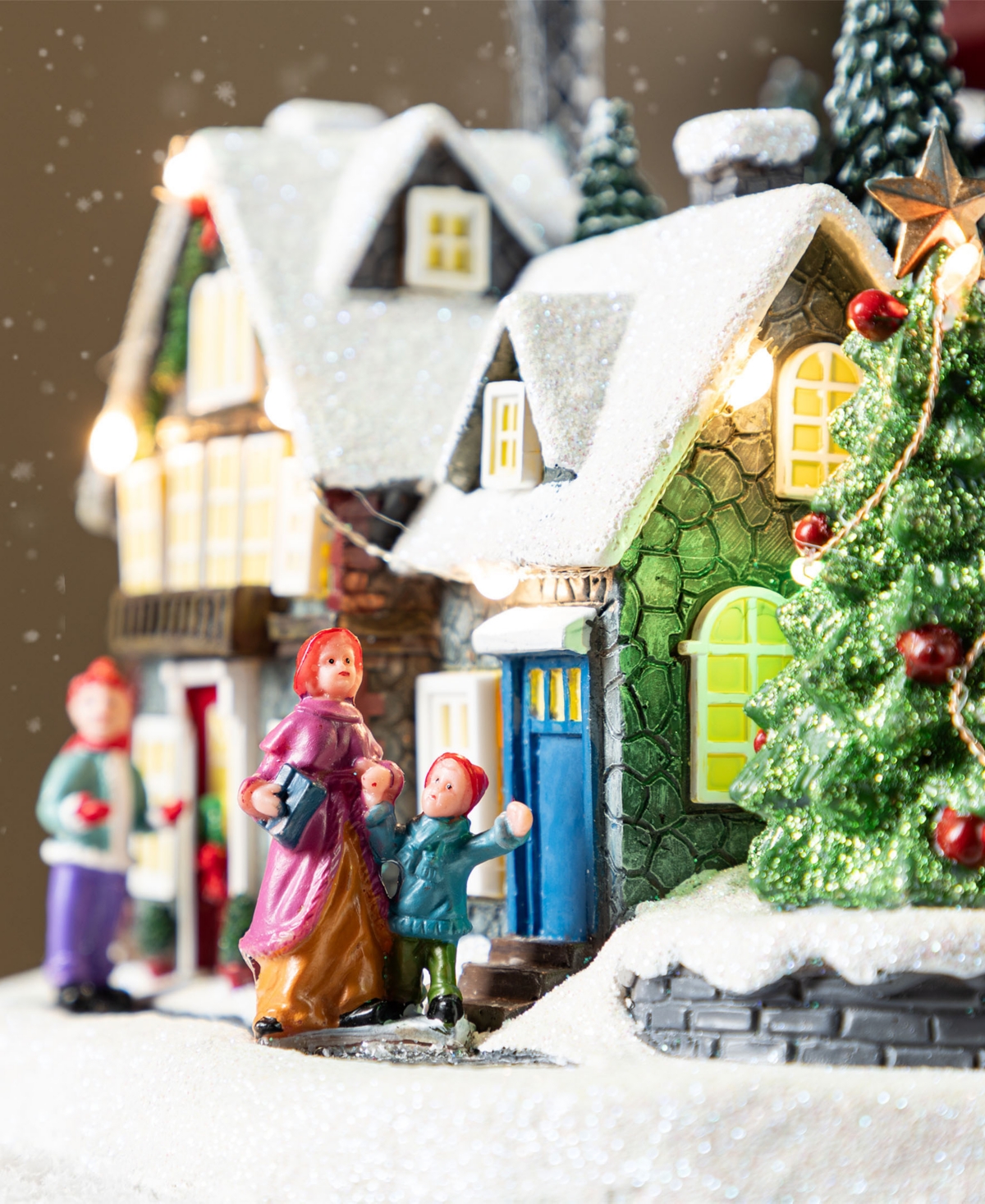 Glitzhome 16" Christmas Oversized Resin Lighted Musical Skiing Village In Multi