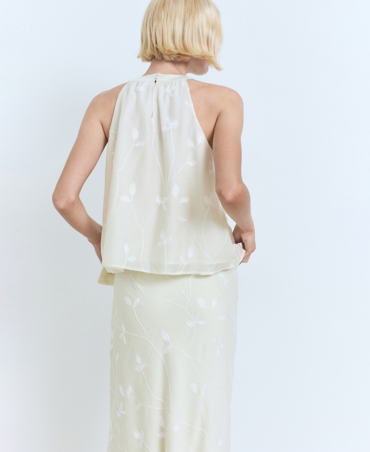 Mango Knot Detail Floral Halter Top In Sand