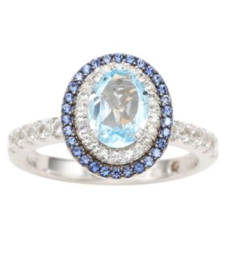 Suzy Levian Sterling Silver Oval Cut Topaz and Sapphire Double Halo Ring