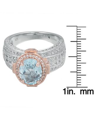 Suzy Levian Two-Tone Sterling Silver Oval Cut Center Topaz Cocktail Milano Ring