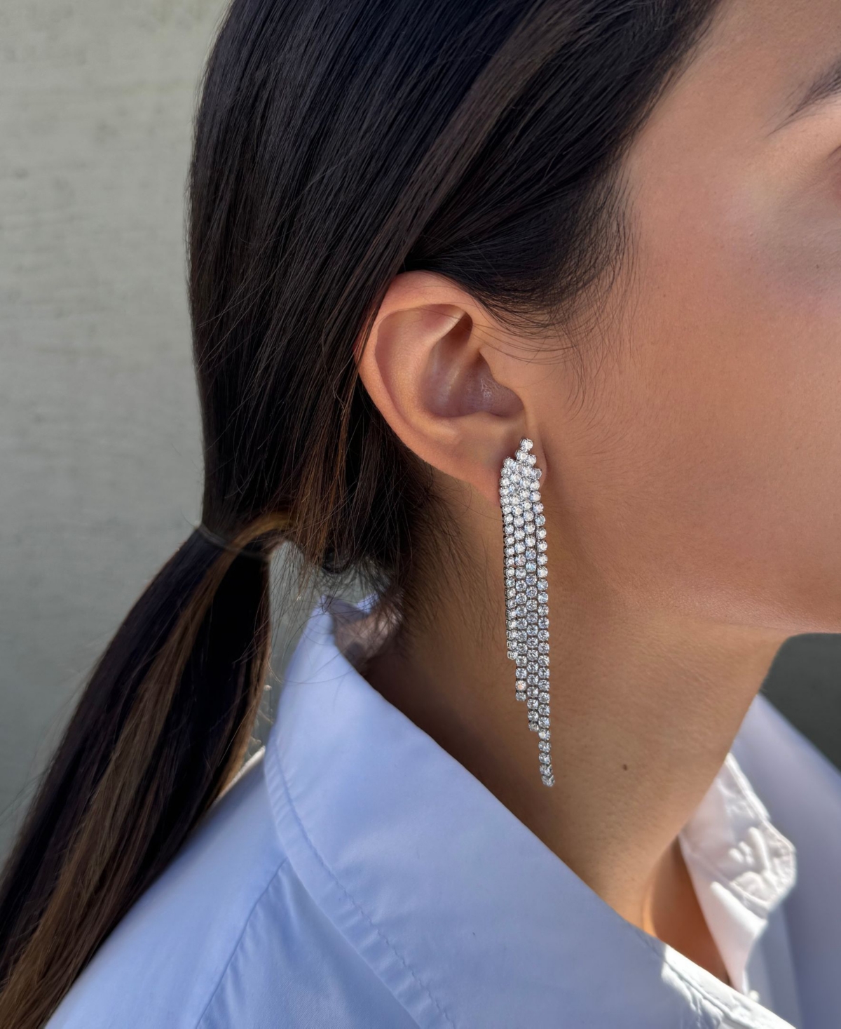 Adornia Silver Crystal Cascade Sweeper Earrings In White