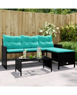 Garden Sofa Black sofa with blue cushions