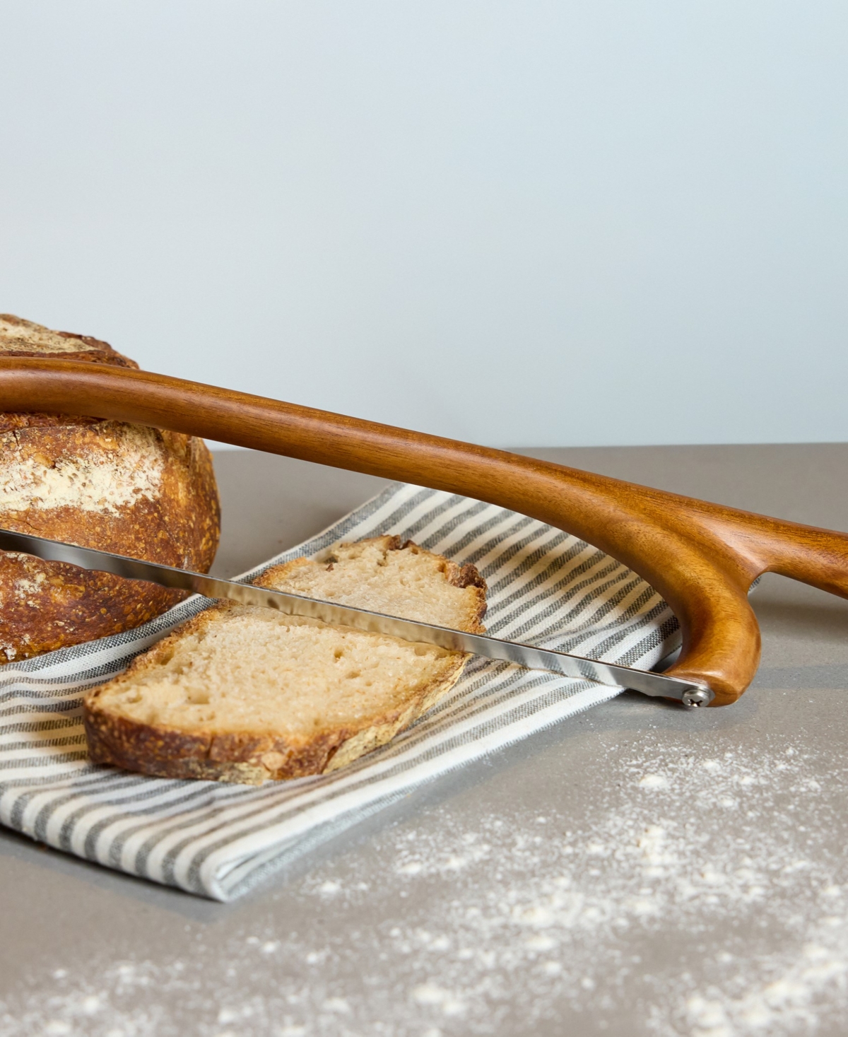 Nambe Breaking Bread Serrated Knife In Brown