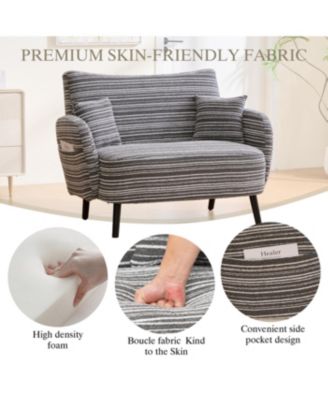 Streamdale Modern two-seater sofa with armrests, pillows, and storage pockets