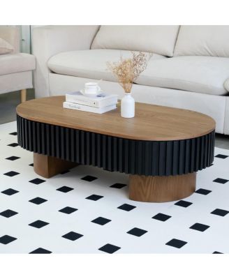 Elliptical coffee table with storage