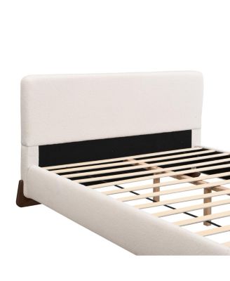 Elegant white queen upholstered bed with dark brown solid wood legs