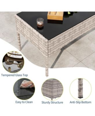 4-Piece Rattan Patio Furniture Set with Upholstered Sofa and Coffee Table