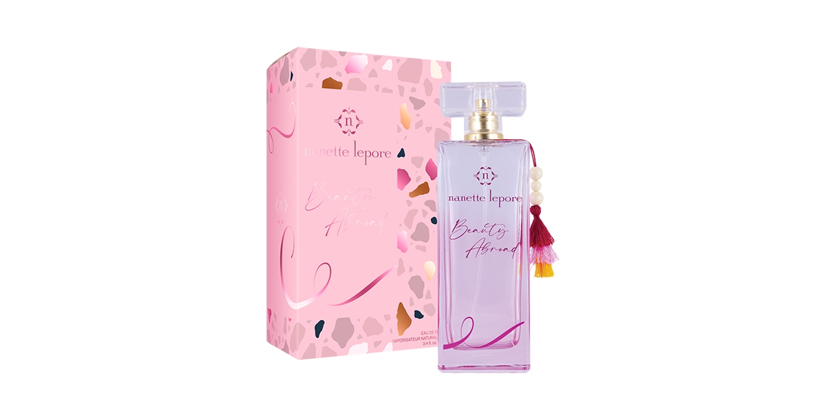 Nanette Lepore Beauty Abroad Perfume 3.4 oz - Clear glass with a soft pink hue.