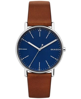 brown leather strap blue face watch
