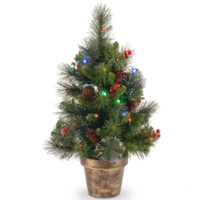 National Tree Company - 2' Crestwood Spruce Small Tree with Silver Bristle, Cones, Red Berries and Glitter in a Plastic Bronze Pot with 35 Battery Operated Multi LED Lights