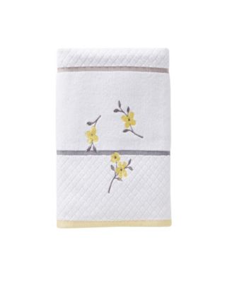yellow and gray bath towels
